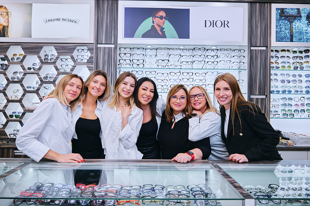 The Mega Vision Brooklyn team standing together at the eyewear boutique